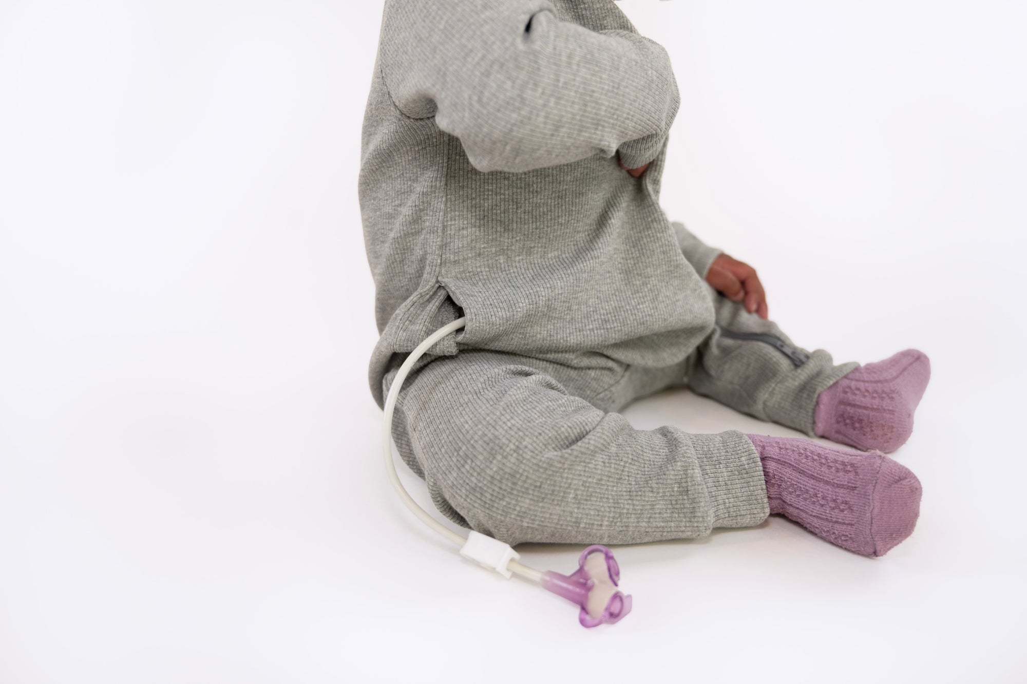 Closeup of G-Tube coming out of side slit