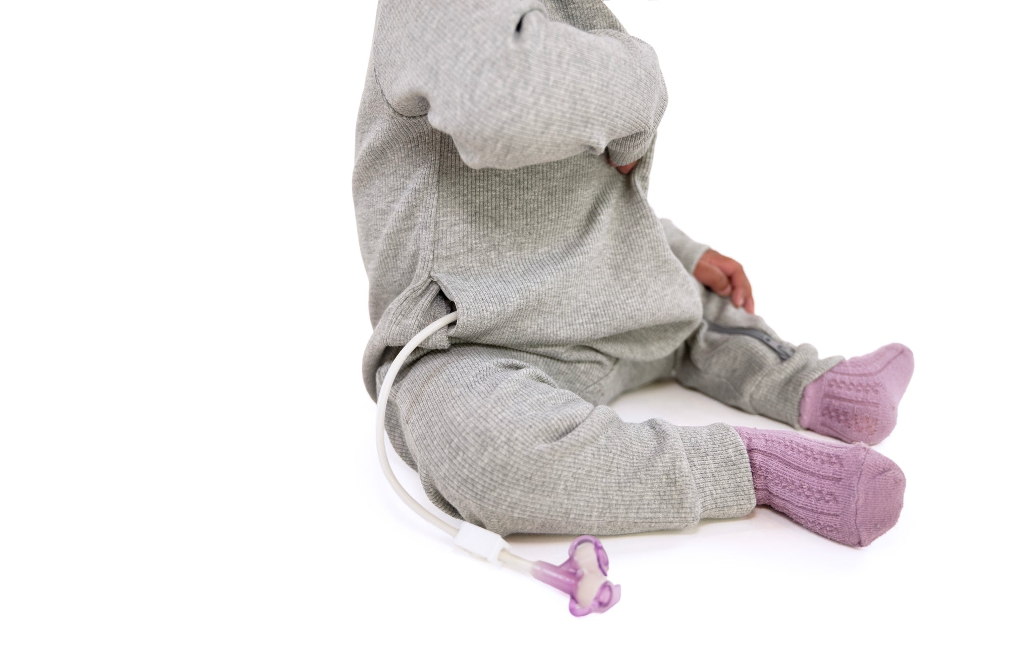 Closeup of G-Tube coming out of side slit