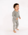 Child standing wearing Heather Gray Rib G-Tube Pajamas