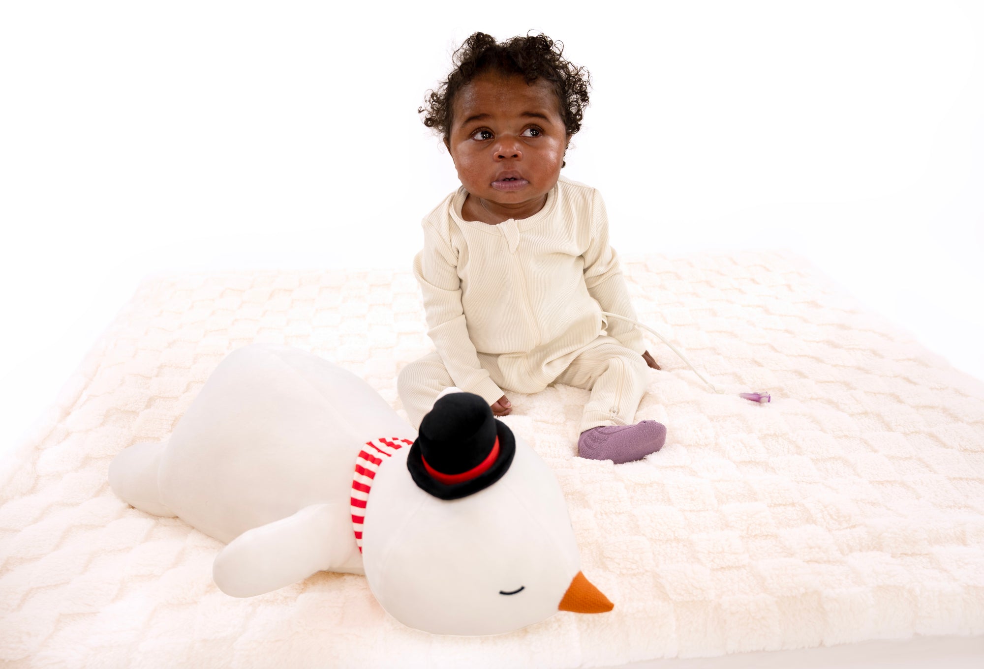 Baby sitting wearing Vintage White Rib G-Tube Pajamas