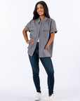 Celia is 5'4" wearing a size M