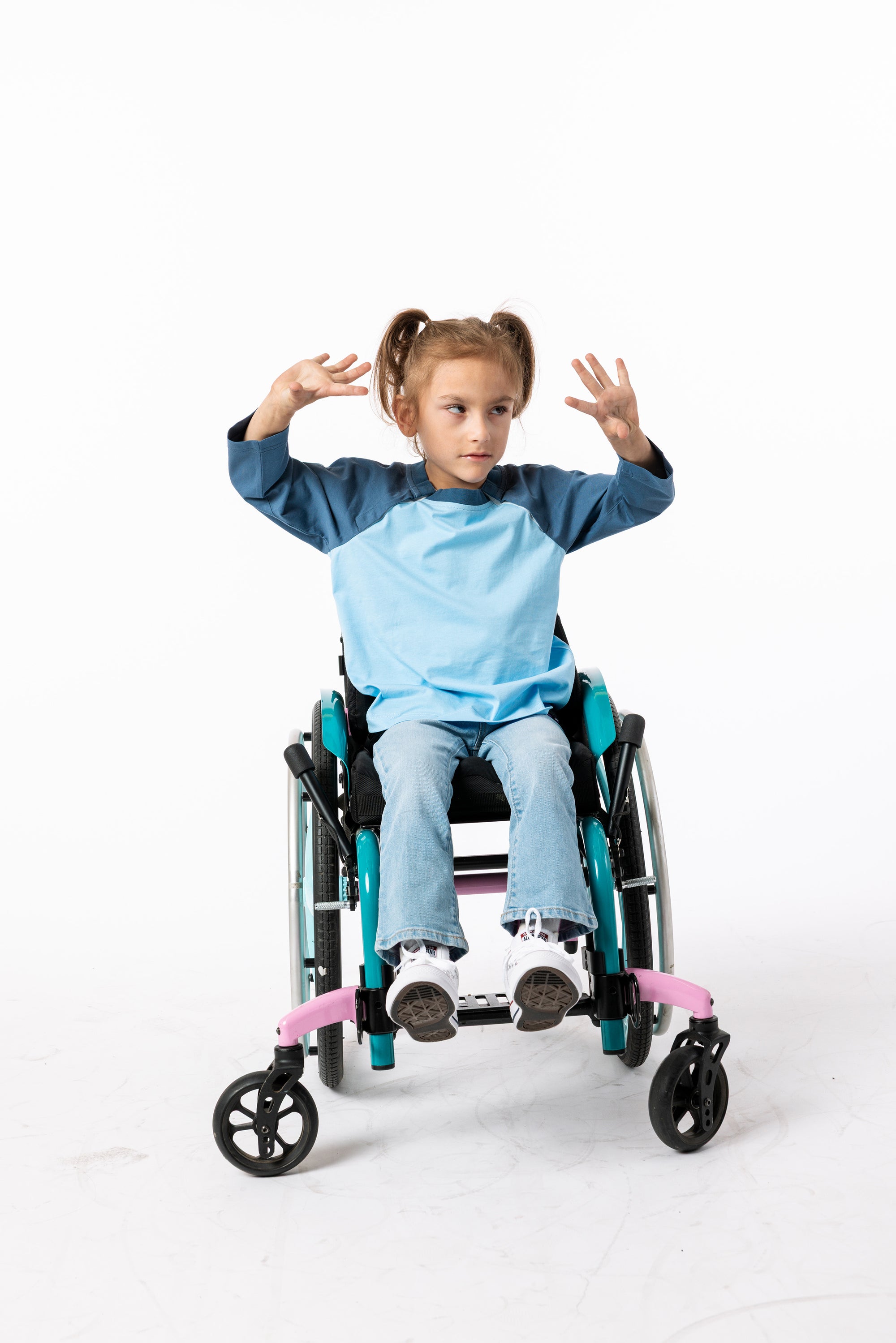 Gracie wearing Blue  CB Kids Raglan Access Tee