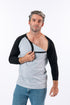 Male model unsnapping chest snaps on Black Raglan Access Tee