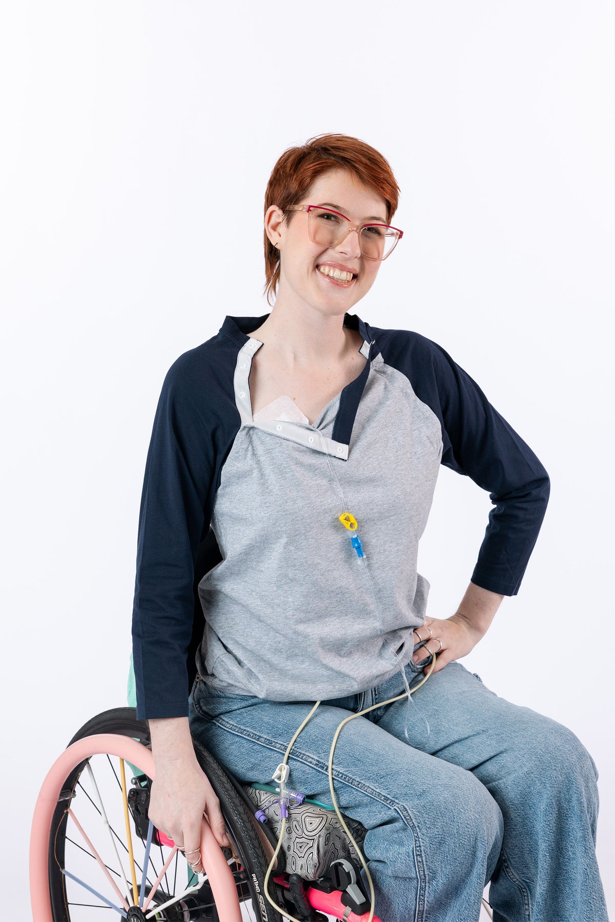 Female model with open chest snaps, showing port