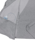 Wrap blouse with drainage bulb in pocket Closeup
