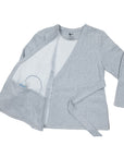 Wrap blouse with drainage bulb in pocket