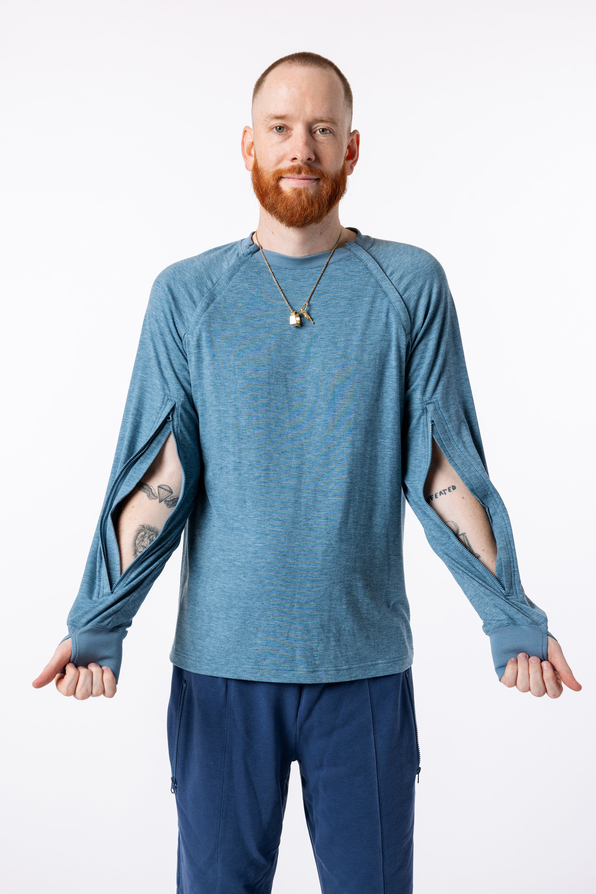 Mike showcasing open sleeve zippers