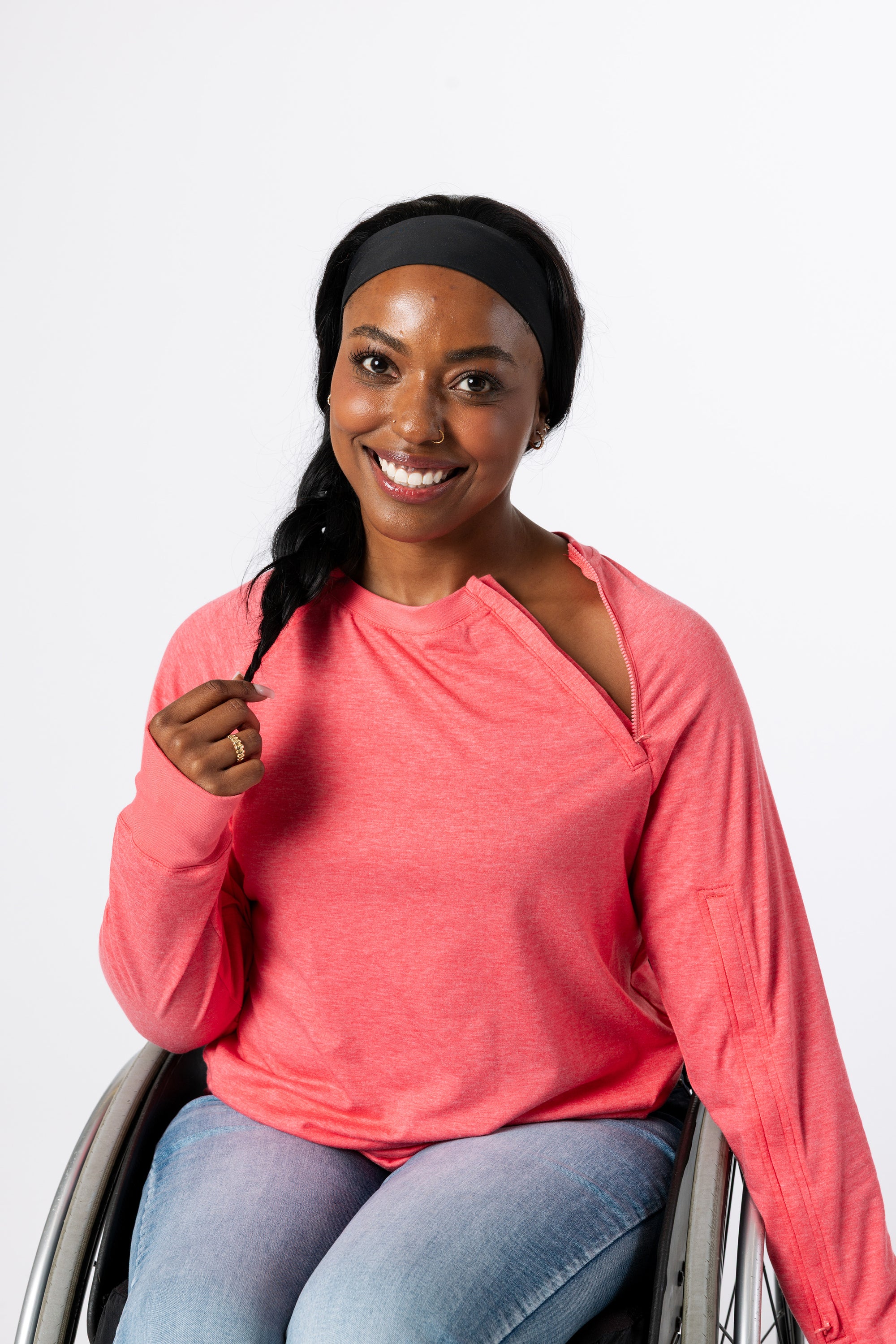 Denisha posing with open chest zipper