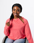 Denisha posing with open chest zipper