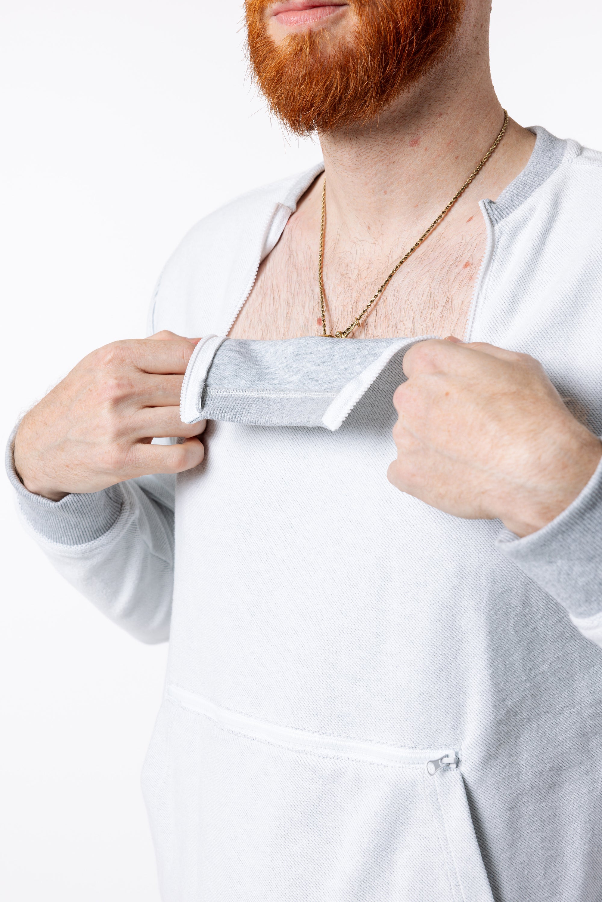 Mike showing open chest zippers