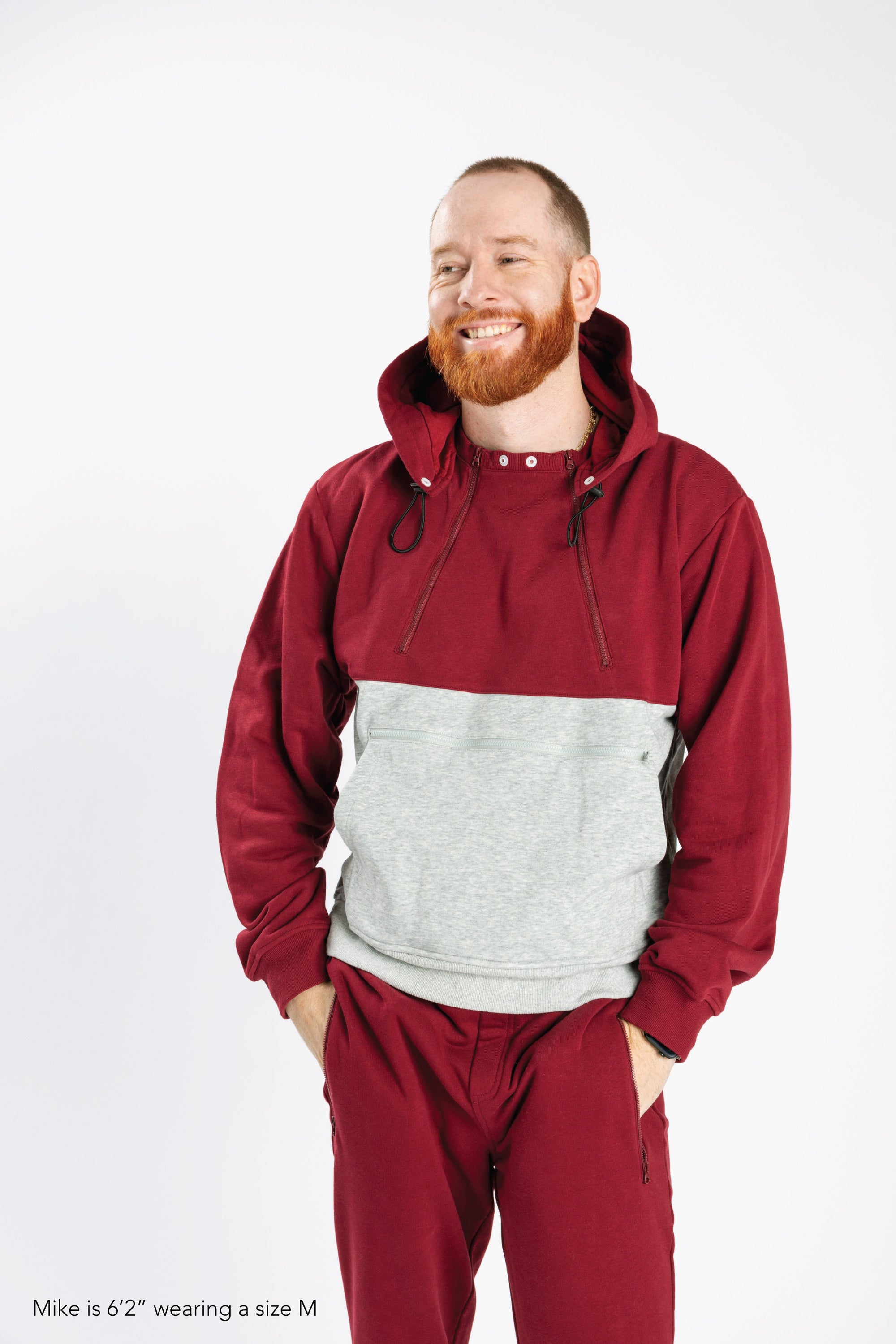 Closeup of Mike wearing Crimson Colorblock Hoodie, 6'2" wearing a size M