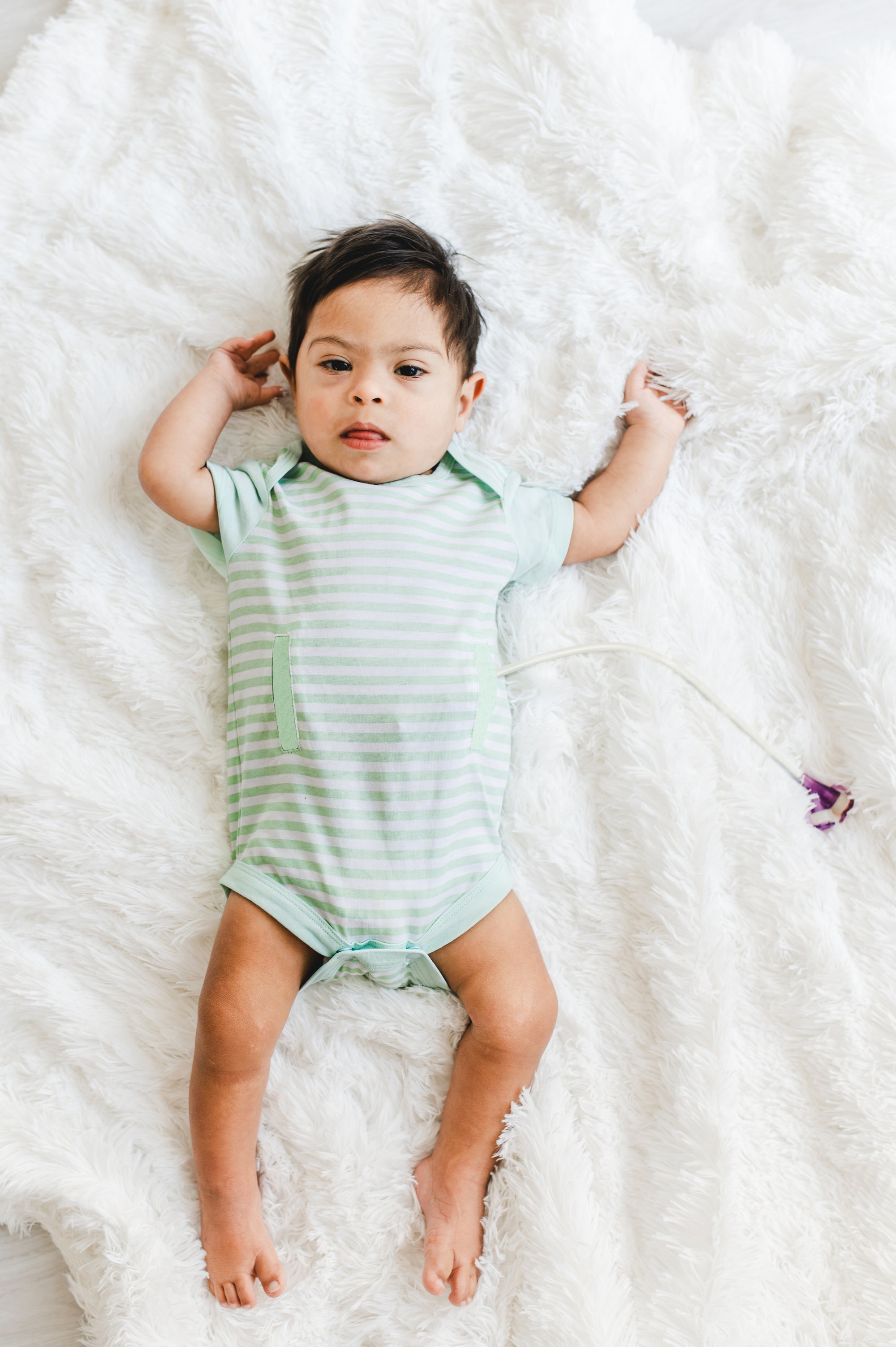 Boy in side access bodysuit