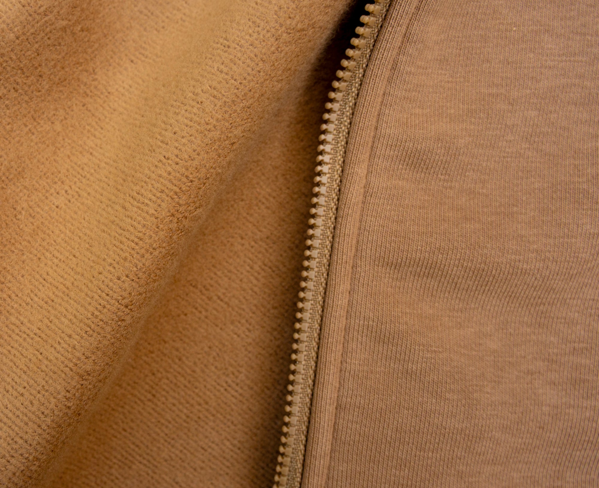 Closeup of inside and outside of Khaki Sweatshirt fabric