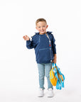 Child wearing a blue hoodie with medical device 