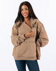 Female Model showing chest zipper opening on Khaki Zipper Access Hoodie
