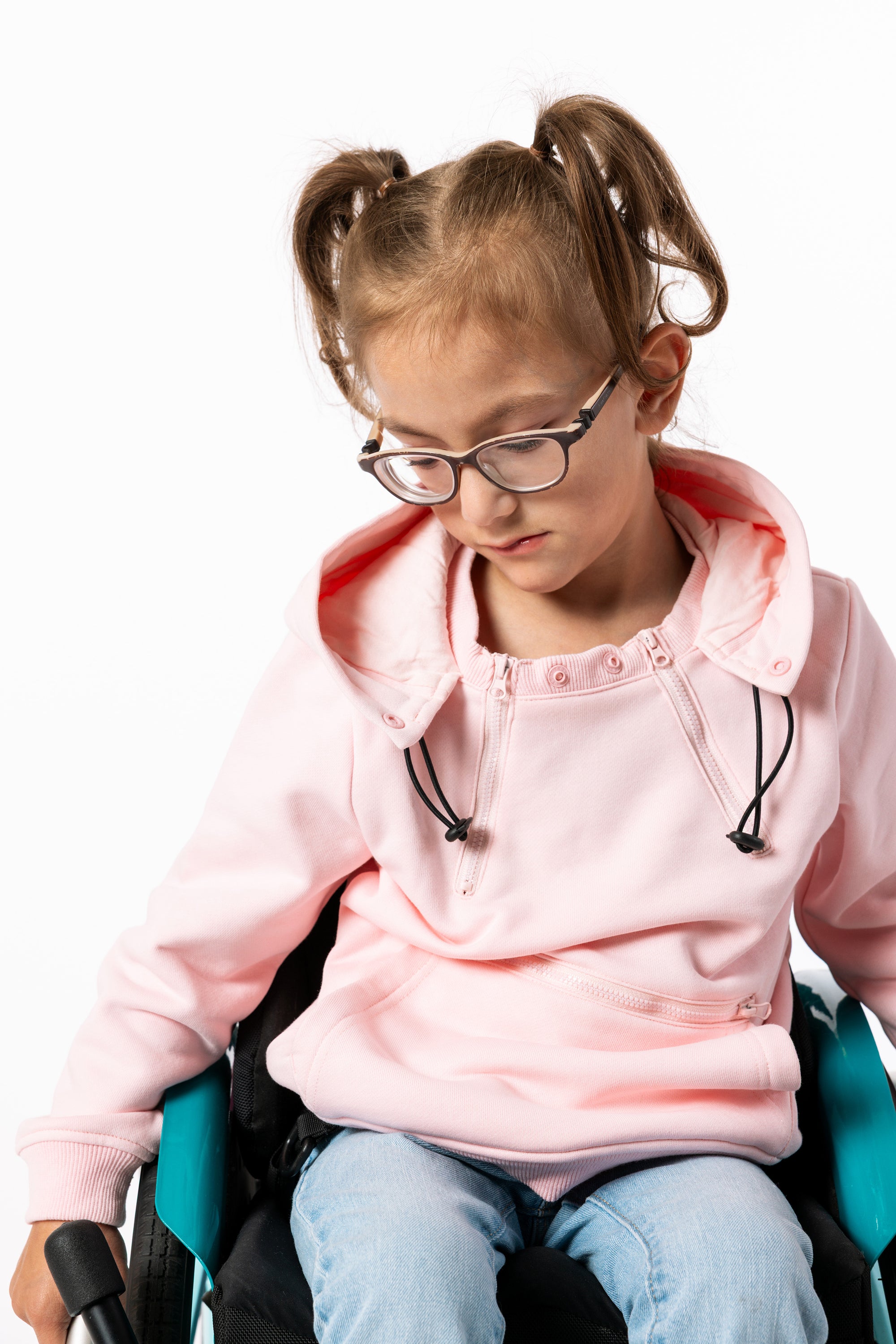 Closeup of Gracie wearing Pink Zipper Access Hoodie