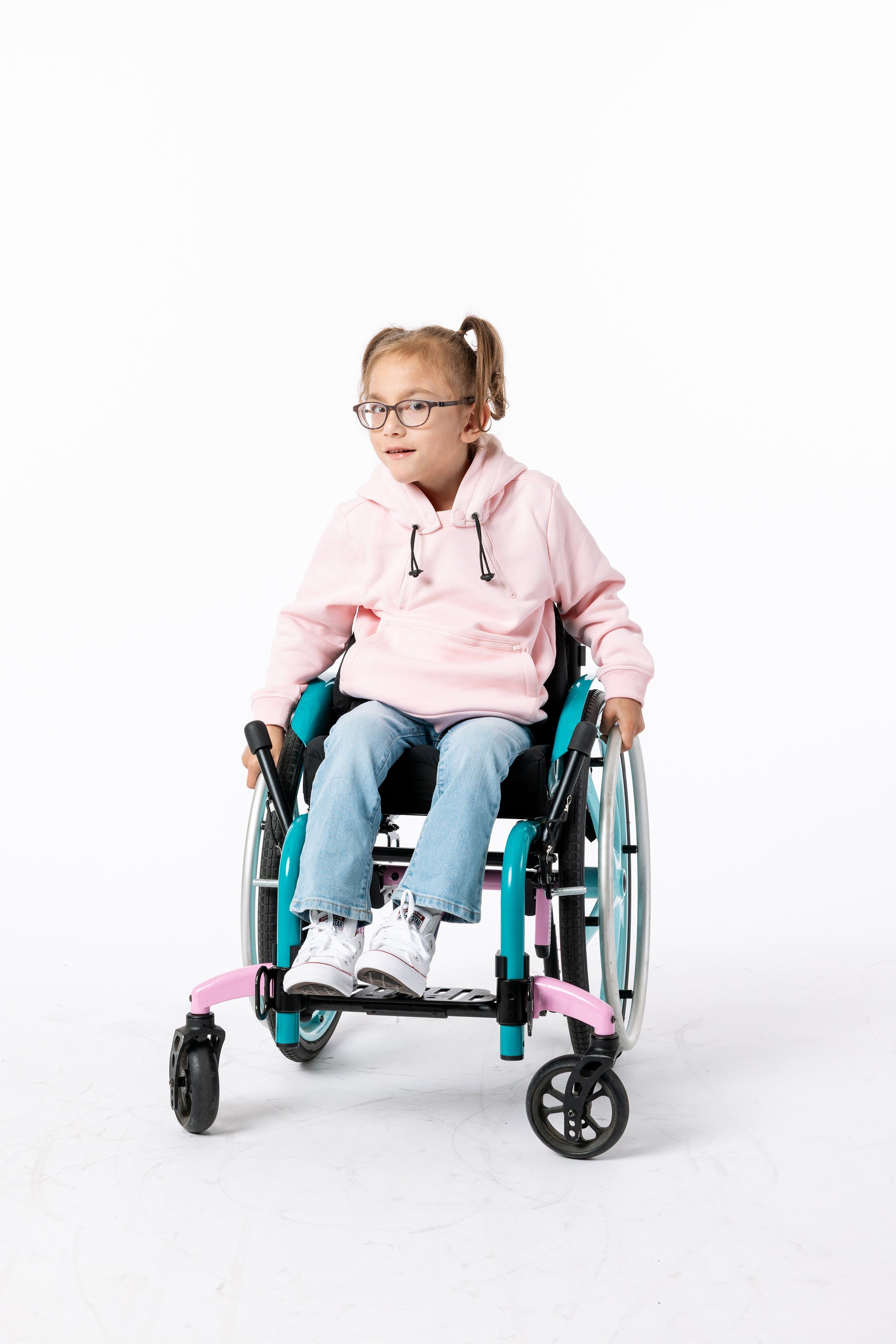 Gracie wearing Pink Zipper Access Hoodie in wheelchair