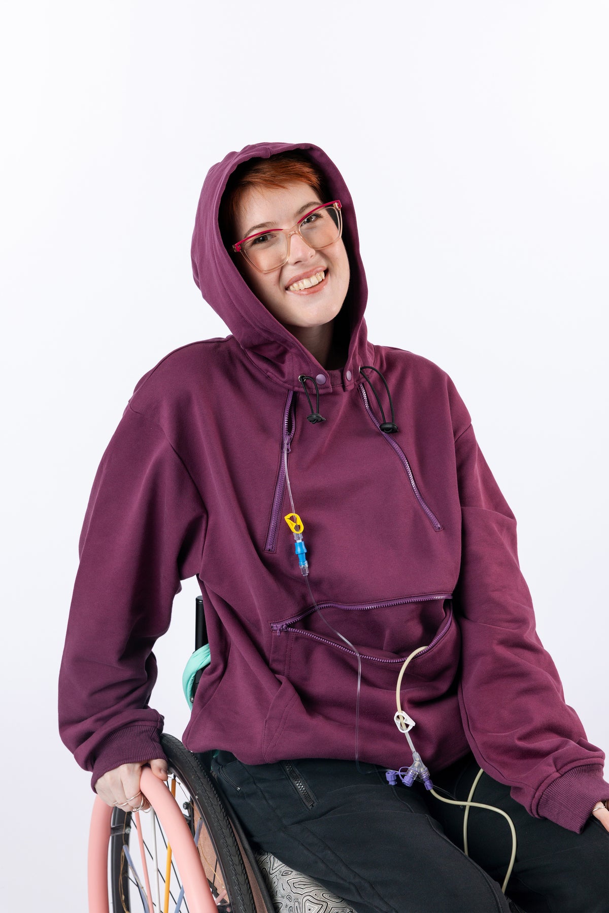 Woman smiling with hood over head