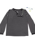 Flat of yarn dye zip access tee with one chest zipper open and tubing coming through