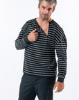 Man showing open chest zipper on Zip Chest Access Tee