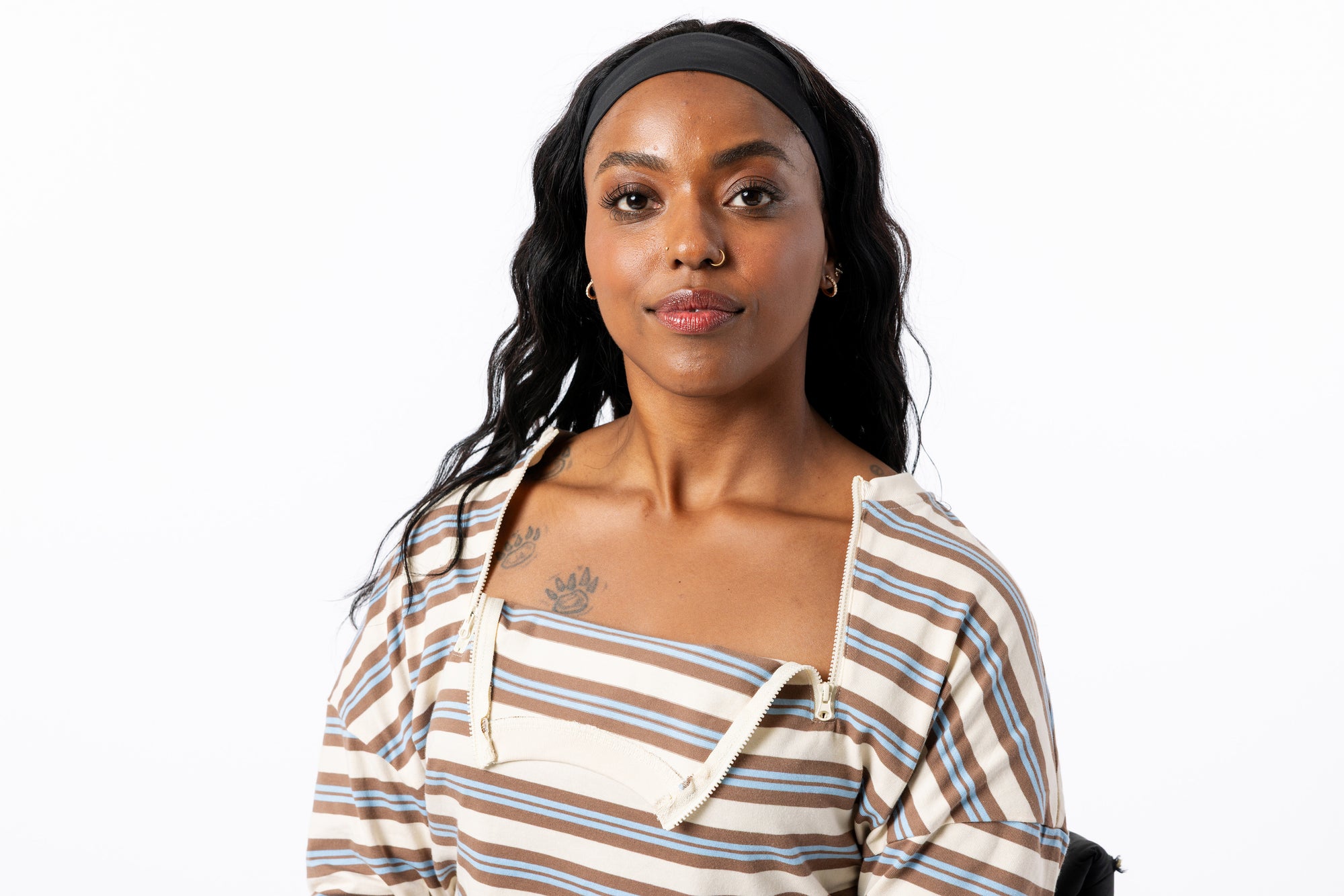 Denisha showing chest zippers