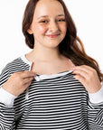 Alex showing open chest zippers on Zip Access Tee