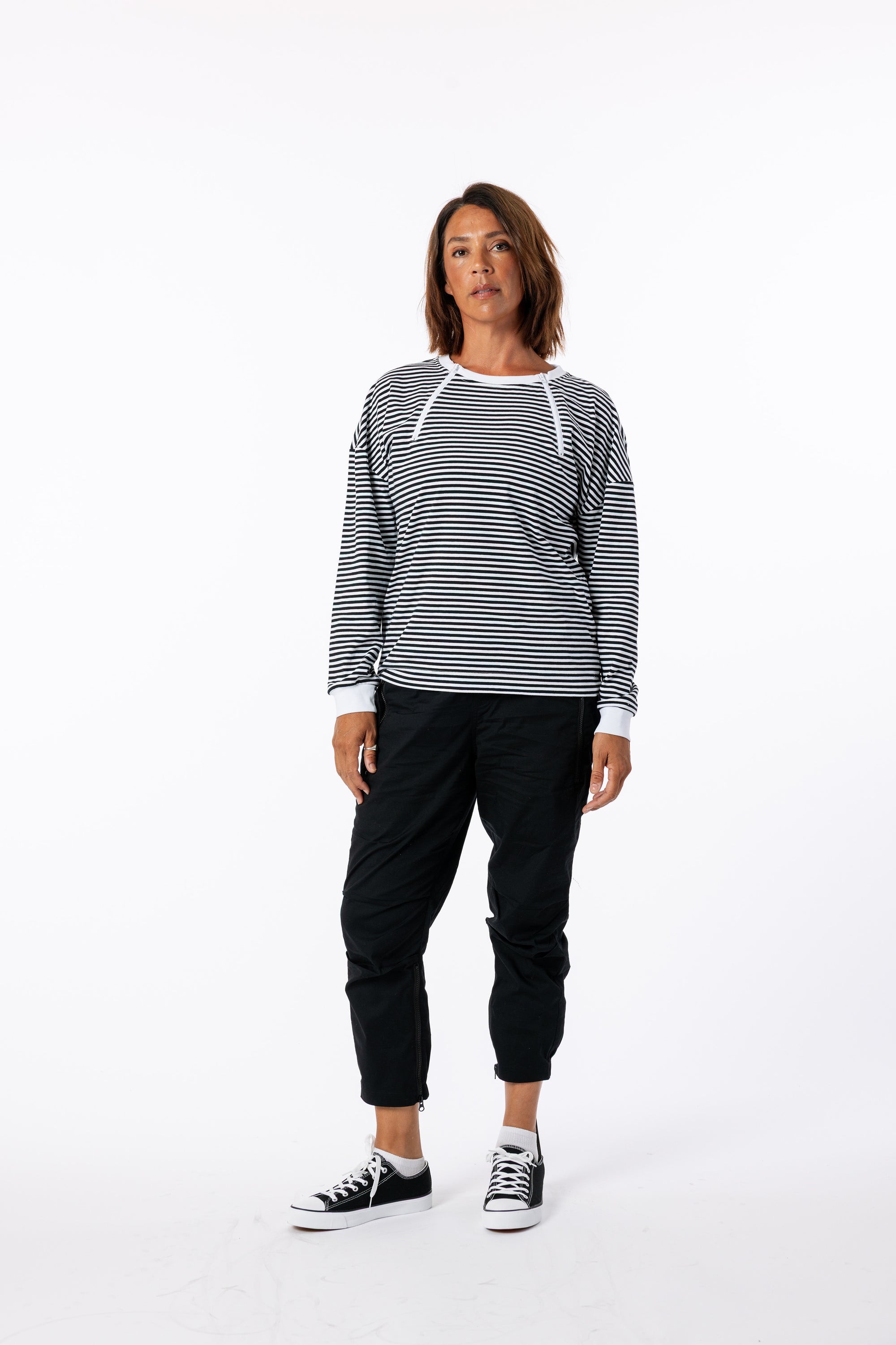 Michelle posing in Zip Access Tee and Casual Zip Pants