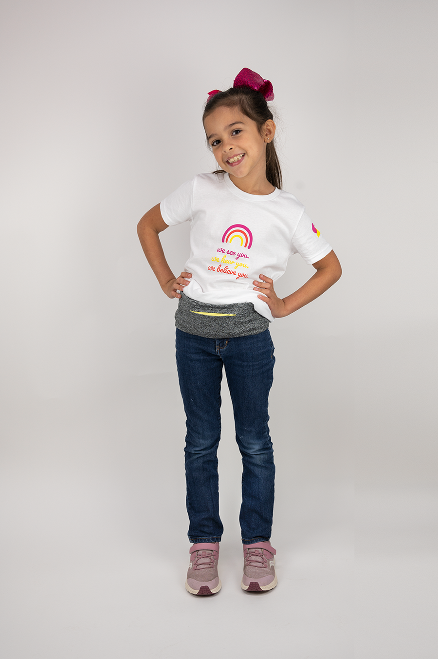 Girl standing wearing charcoal insulin pump belt