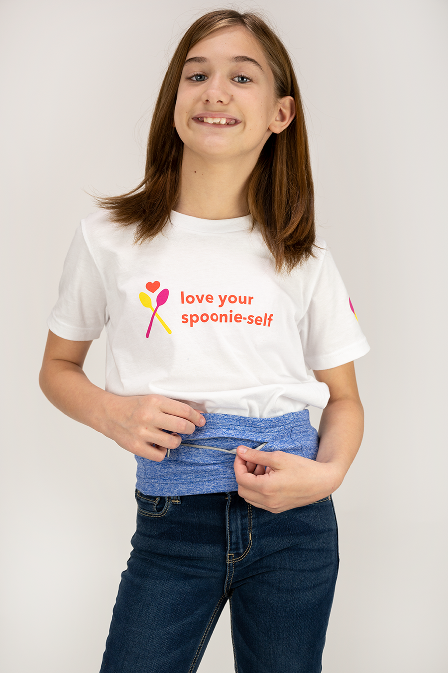 Girl wearing white Youth “Love Your Spoonie Self” T-Shirt